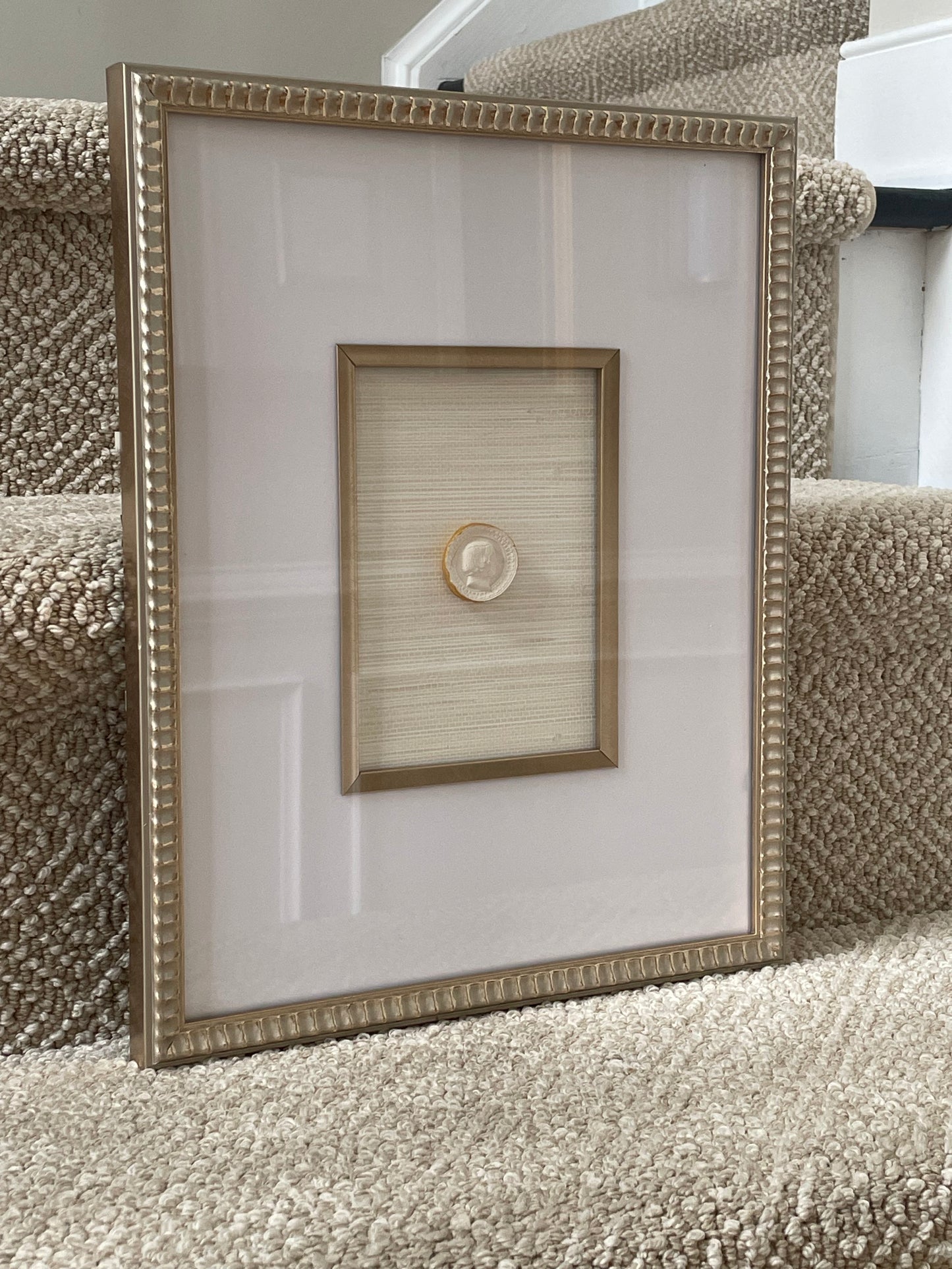 Scalloped Frame Intaglio with Cream Grasscloth Background