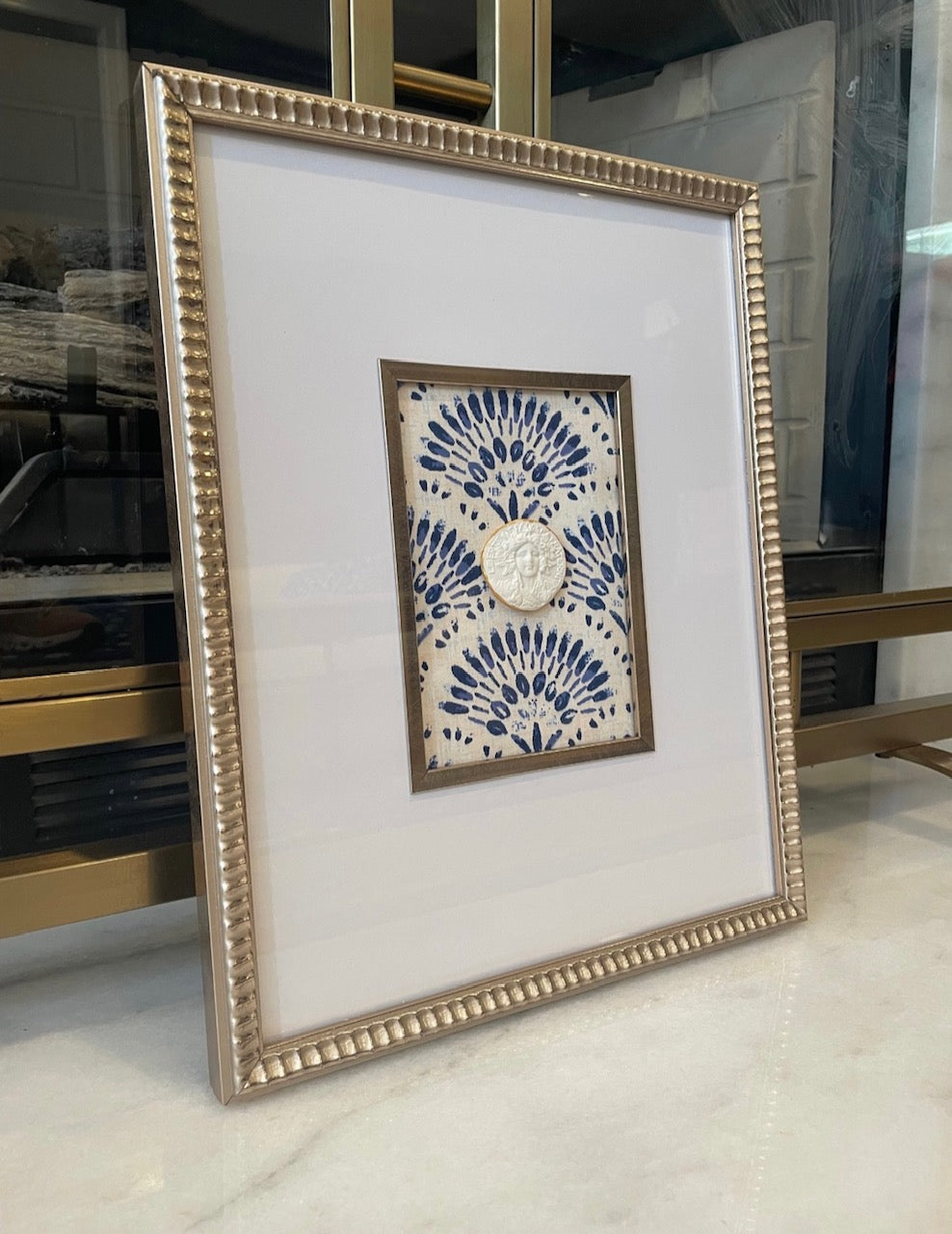 Scalloped Frame Intaglio with Blue and White Designer Fabric Background