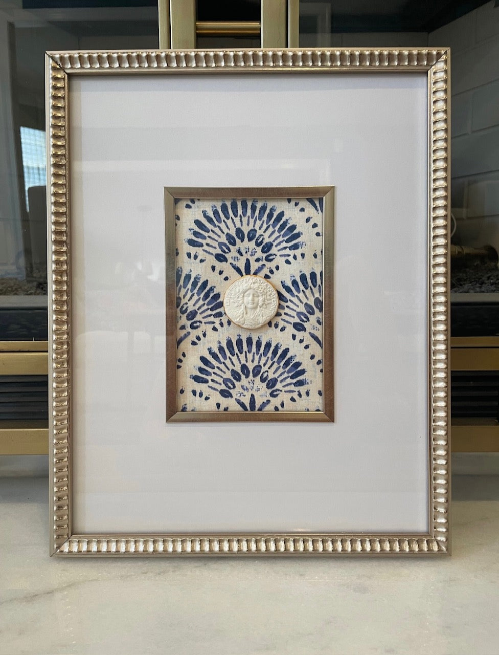 Scalloped Frame Intaglio with Blue and White Designer Fabric Background